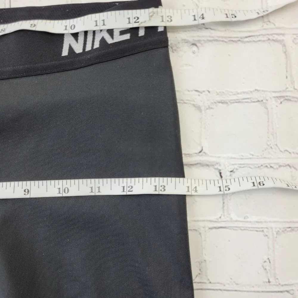 ✅ Nike Dri-FIT Women Black solid Print Training Capris Leggings Size M